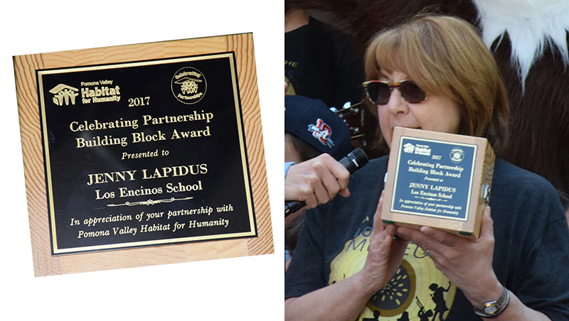 Jenny is presented with a Habitat for Humanity award.